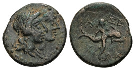 Caria, Iasos. Ae, 6.29 g 21.25 mm. Circa 250-190 BC.
Obv: Jugate heads of Apollo and Artemis.
Rev: IAΣΕΩΝ. Hermias swimming with dolphin right.
Ref...