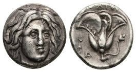 Caria, Rhodos. AR Didrachm, 6.72 g 18.49 mm. Circa 305-275 BC.
Obv: Head of Helios facing slightly right
Rev: [ΡΟ]ΔΙΟΝ; rose with bud to right; thun...
