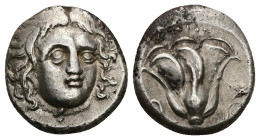 Caria, Rhodos. AR Didrachm, 6.73 g 19.05 mm. Circa 305-275 BC.
Obv: Head of Helios facing slightly right
Rev: ΡΟΔΙΟΝ; rose with bud to right; [thund...