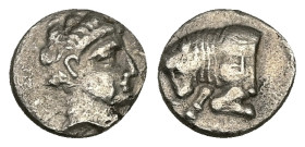 Caria, Uncertain ('Mint E'). AR Diobol, 1.04 g 10.89 mm. Circa 380-340 BC. 
Obv: Head of young male right 
Rev: Forepart of bull left, Carian letter y...