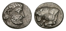Caria, Uncertain ('Mint E'). AR Diobol, 1.13 g 9.98 mm. Circa 380-340 BC. 
Obv: Head of male right, wearing beard 
Rev: Forepart of bull left; Carian ...