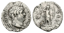 Hadrian AD 117-138. AR, Denarius. 2.60 g. 19.56 mm. Rome.
Obv: HADRIANVS AVGVSTVS. Head of Hadrian, laureate, right.
Rev: COS III. Victory, naked to w...