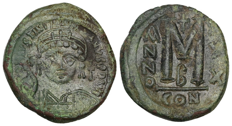 Justinian I, AD 527-565. AE, Follis. 17.67 g. 17.49 mm. Constantinople. 
Obv: [D...