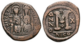 Justin II and Sophia. AD 565-578. AE, Follis. 13.85 g. 30.72 mm. Nicomedia. Dated RY 10 (574/75).
Obv: DNIVSTI-[NVSPPAVC]. Justin II on left and Sophi...