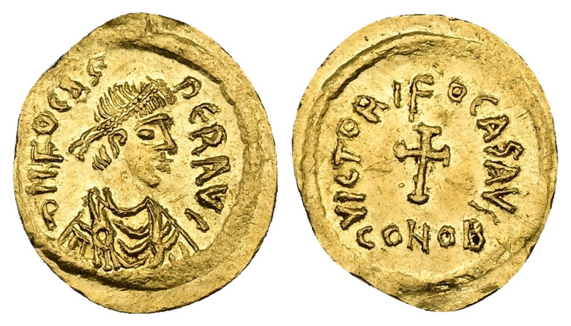 Phocas, AD 602-610. AV, Tremissis, 1.48 g. 16.94 mm. Constantinople.
Obv: DNFOCA...