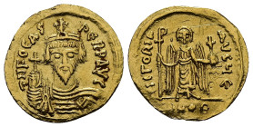 Phocas, AD 602-610. AV, Solidus. 4.36 g. 20.78 mm. Constantinople.
Obv: δNFOCAS-PЄRPAVC. Frontal bust of Phocas bearded, wearing cuirass, paludamentum...