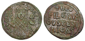 Theophilus, AD 830-842. AE, Follis. 5.20 g. 24.16 mm. Constantinople.
Obv: ΘEOFIL-bASIL. Crowned, three-quarter length figure of Theophilus facing, pe...