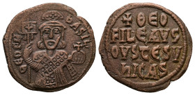 Theophilus, AD 830-842. AE, Follis. 6.70 g. 27.57 mm. Constantinople.
Obv: ΘEOFIL-bASIL. Crowned, three-quarter length figure of Theophilus facing, pe...