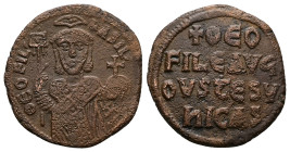 Theophilus, AD 830-842. AE, Follis. 7.52 g. 26.84 mm. Constantinople.
Obv: ΘEOFIL-bASIL. Crowned, three-quarter length figure of Theophilus facing, pe...