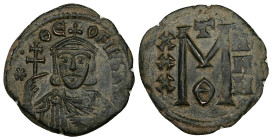 Theophilus, AD 830-842. AE, Follis. 7.83 g. 28.42 mm. Constantinople.
Obv: ✷ΘE-OFILbASIL. Crowned, three-quarter length figure of Theophilus facing, w...