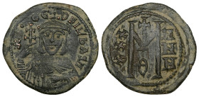 Theophilus, AD 830-842. AE, Follis. 8.61 g. 29.69 mm. Constantinople.
Obv: ✷ΘE-OFILbASIL. Crowned, three-quarter length figure of Theophilus facing, w...