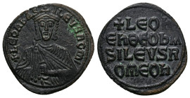 Leo VI the Wise, AD 886-912. AE, Follis. 6.00 g. 21.00 mm. Constantinople.
Obv: + LЄOҺЬAS-ILЄVSROM. Frontal bust of Leo VI with short beard wearing ch...