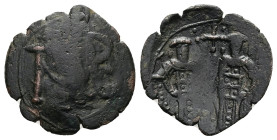 Michael VII Palaeologos and Andronicus II, AD 1272-1282. AE, Trachy. 2.16 g. 17.25 mm. Constantinople. 
Obv: Large N-B.
Rev: Andronicus on left and Mi...