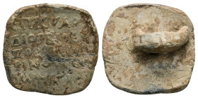 PB Roman provincial stamp seal (c. AD 1st–3rd centuries)
Obv: Greek inscription of five lines.
Rev: Handle on plain back.
Weight: 10.07 g.
Diamete...