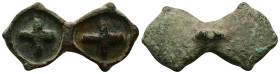 AE Byzantine bronze bread-stamp (AD 5th–6th centuries) 
A bronze bread-stamp formed as a two discoid panels, both with a cross; missing its handle on ...