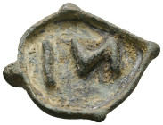 AE Romano-Byzantine bread-stamp (c. AD 3rd–5th centuries) 
Bronze piriform bread stamp with radiating lobes, central Greek letters: NI in relief: Νι(κ...