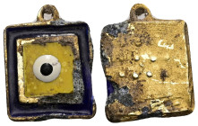 Golden square pendant amulet (AD 1st-3rd centuries) 
A square gold pendant with an attachment loop, in set yellow glass panel within a golden frame. E...