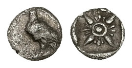 Asia minor, Uncertain. AR Tetartemorion, 0.15 g 5.47 mm. Circa 5th century BC.
Obv: Eagle standing left.
Rev: Stellate pattern within incuse square.
R...