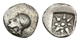 Asia Minor, Uncertain. AR Hemiobol, 0.43 g 8.47 mm. Circa 440-390 BC.
Obv: Helmeted head of Athena left.
Rev: Star of eight rays within incuse square....