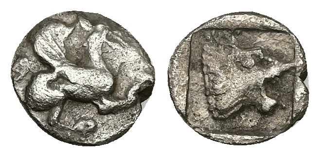 Troas, Assos. AR Hemiobol, 0.57 g 9.42 mm. Circa 500-450 BC.
Obv: Griffin seated...