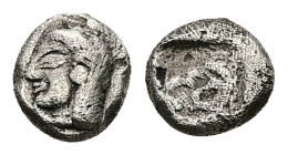 Troas, Kebren. AR Hemiobol or Obol, 0.59 g 7.44 mm. 5th century BC.
Obv: Archaic head (Apollo?) left.
Rev: Head of ram left within incuse square.
Ref:...