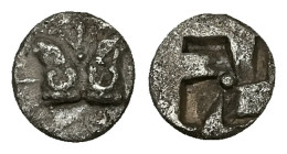 Troas, Kebren. AR Hemiobol, 0.44 g 8.09 mm. Circa 420-412 BC.
Obv: Confronted heads of rams; floral sprig between.
Rev: Quadripartite incuse square.
R...