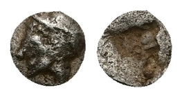 Ionia, Phokaia. AR Tetartemorion, 0.15 g 5.42 mm. Circa 521-478 BC. 
Obv: Female head left, wearing helmet or close fitting cap.
Rev: Quadripartite in...