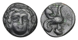Caria, Kaunos. Ae, 1.16 g 9.85 mm. Circa 386-300 BC.
Obv: Facing head of Apollo 
Rev: Δ-[Γ], Sphinx seated left. 
Ref: SNG Keckman 828; Troxell 30.
Fi...
