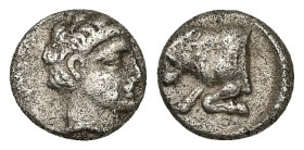 Caria, Uncertain ('Mint E'). AR Diobol, 1.29 g 10.35 mm. Circa 380-340 BC. 
Obv: Head of young male right 
Rev: Forepart of bull left, Carian letter y...