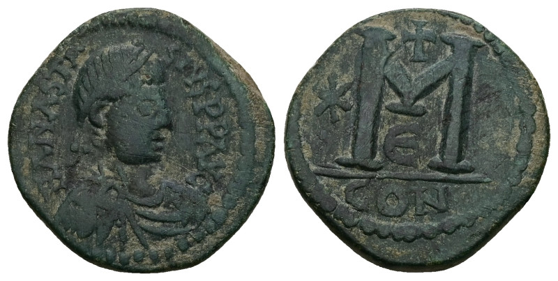 Anastasius I, AD 491-518. AE, Follis. 9.66 g. 24.60 mm. Constantinople.
Rev: DNA...