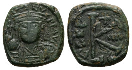 Justin II, AD 565-578. AE, Half Follis. 5.71 g. 21.67 mm. Uncertain mint.
Obv: DN IVSTI-NVSPPAV. Frontal bust of Justin II with cuirass and helmet wit...