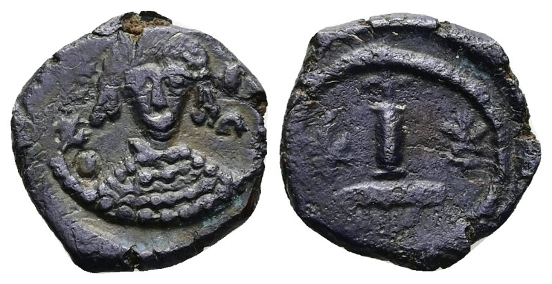 Maurice Tiberius (?), AD 582-602. AE, Follis. 2.91 g. 18.37 mm. Uncertain mint.
...