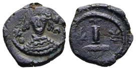Maurice Tiberius (?), AD 582-602. AE, Follis. 2.91 g. 18.37 mm. Uncertain mint.
Obv: Crowned, draped and cuirassed bust facing, holding cross on globe...