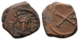 Phocas, AD 602-610. AE, Decanummium. 3.80 g. 19.66 mm.
Obv: [DN]FOCA- [P]ERP A[VG], crowned with pendilia, mantled bust facing.
Rev: Large X, cross ab...