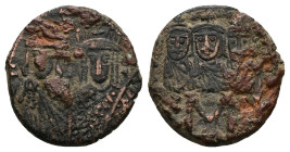 Constantine VI, Irene, AD 780-797. AE, Follis. 4.11 g. 19.38 mm. Constantinople.
Obv: Crowned busts of Constantine VI, wearing chlamys, holding cross ...