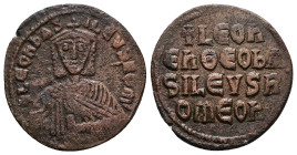 Leo VI the Wise, AD 886-912. AE, Follis. 7.10 g. 27.14 mm. Constantinople.
Obv: + LЄOҺЬAS-ILЄVSROM. Frontal bust of Leo VI with short beard wearing ch...
