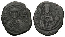 Manuel I Comnenus, AD 1143-1180. AE, Tetarteron. 3.84 g. 21.48 mm. Thessalonica.
Obv: Γεόργιος.Half-length of St George holding a spear and shield.
Re...