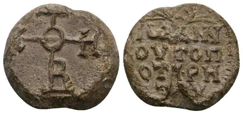 PB Byzantine lead seal of John topoteretes (c. AD 8th century)
Obv: Cruciform i...