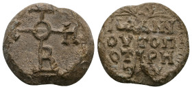 PB Byzantine lead seal of John topoteretes (c. AD 8th century)
Obv: Cruciform invocative monogram (type V): Θεοτόκε βοήθει. Wreath border.
Rev: Insc...