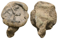 PB Byzantine monogrammatic seal (c. AD 5th–6th centuries)
Obv: Partly visible monogram: Θ, Ε.
Rev: Blank.
Weight: 10.42 g.
Diameter: 25.83 mm.