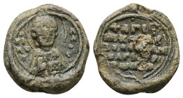 PB Byzantine lead seal (AD 11th century) 
Obv: Bust of St. Nicholas, holding a book in his left hand. Inscription on either side: ὁ (ἅγιος) Νικόλαος. ...