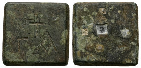 AE Eastern Mediterranean/Aegean. One-ounkia weight (AD 4th – 6th centuries) 
Square in form with plain profile; engraved on the top with a Latin cross...