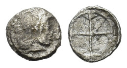 Sicily, Syracuse. Deinomenid Tyranny. 485-466 BC. AR litra (9 mm, 5 g). Under Hieron I, circa. 475-470 BC. Diademed head of Arethusa right. R/ Wheel o...