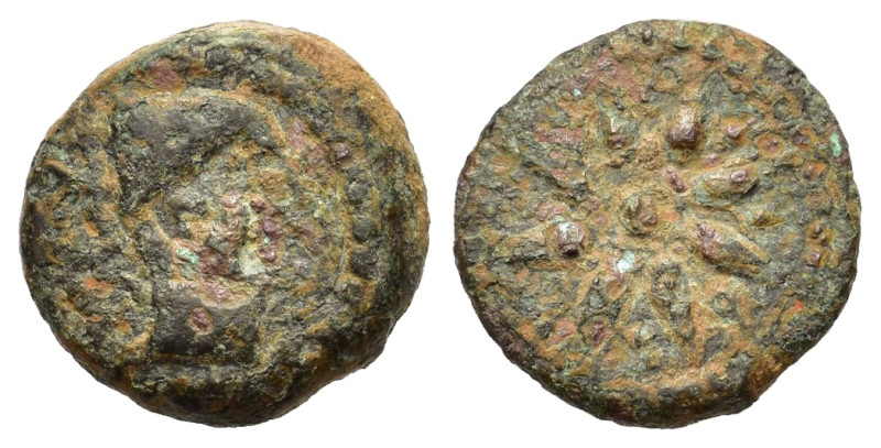 Mauretania. 1st century BC. 1/2 Unit (13,5 mm, 2,4 g) Male head right. R/ Star w...