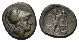 Kings of Macedon. Antigonos II Gonatas. 277 - 239 B.C. AE (19,5mm, 8,50gr.). Helmeted head of Athena right. R/ B-A, Pan erecting trophy to right; mono...