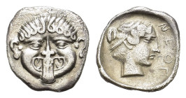 Macedon, Neapolis. 424-404 BC. AR Hemidrachm (13,7mm 1.50gr). Facing gorgoneion with protruding tongue. R/ NEOΠ Head of the nymph of Neapolis, her hai...