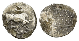 Illyria. Dyrrhachium. Circa. 450-350 BC. AR stater (17 mm, 2,3 g). Cow right, looking back at calf standing left below, suckling. R/two rectangles sid...
