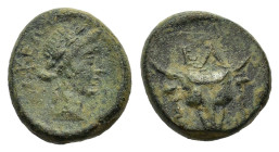 Phokis. Elateia. Early 2nd century BC. Æ (15mm, 4,80gr.). Head of bull facing, fillets hanging from ears; EΛ above. R/  Laureate head of Apollo right;...