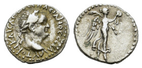Vespasian. AD 69-79. AR Hemidrachm (15,4 mm, 1.7 g) Cappadocia, Caesarea. Laureate head right R/ Nike advancing right, holding wreath and palm. Metcal...