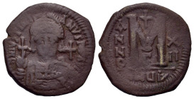 Justinian I. AD 527-565 . Æ Follis (34,5 mm, 18 g). Antioch mint. Dated RY 22 (548/9 AD). Diademed, helmeted, and cuirassed facing bust, holding globu...